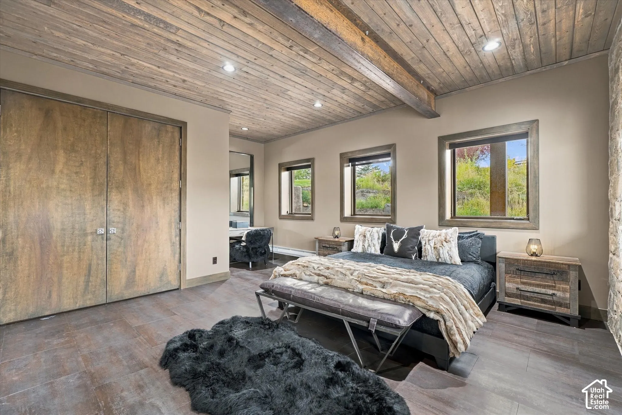 Reclaimed wood-finish ceiling with exposed beam