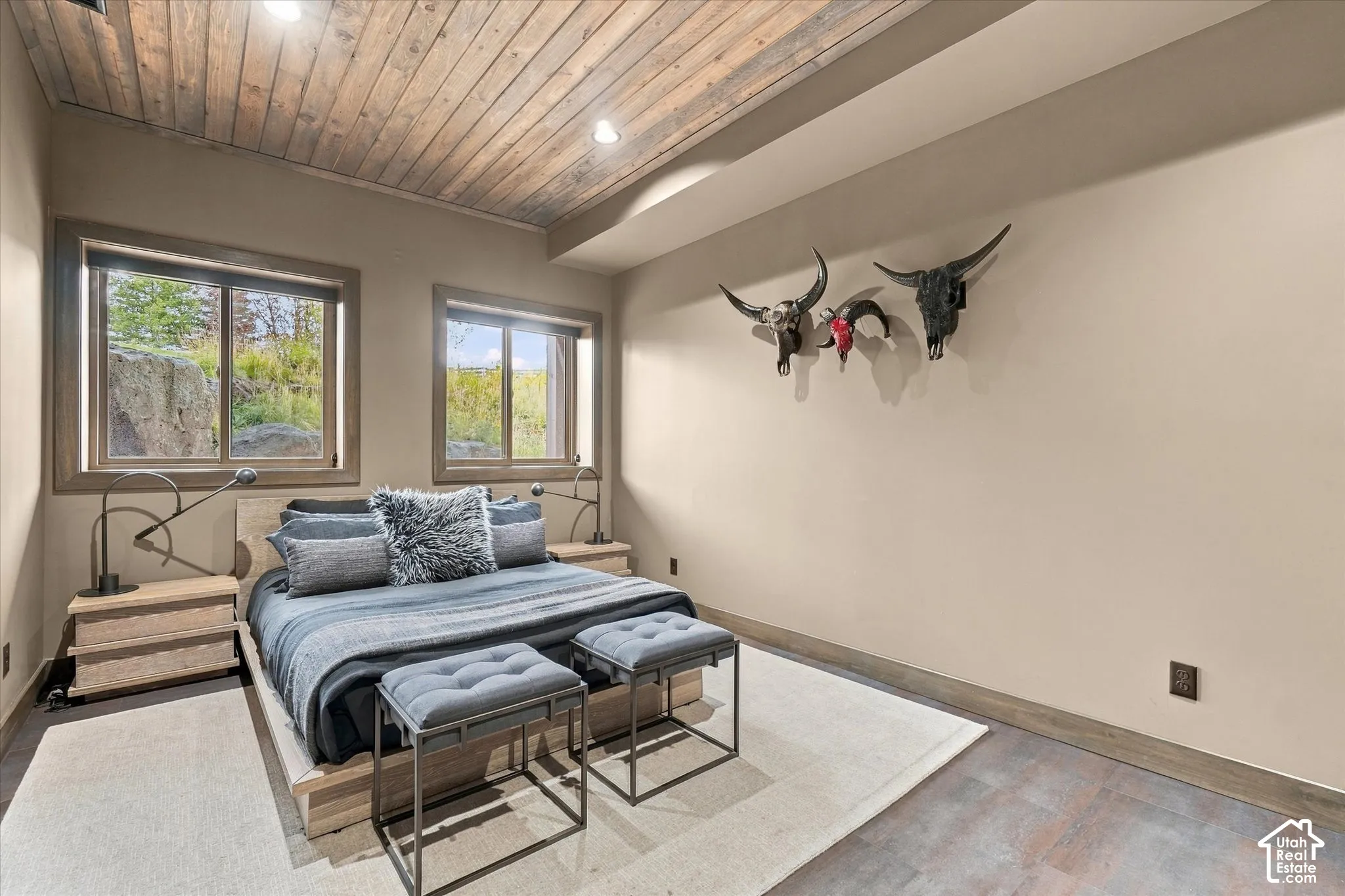 Wood-paneled ceiling with recessed lighting