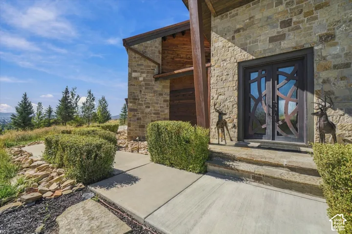 Stone facade with an architectural double entry door