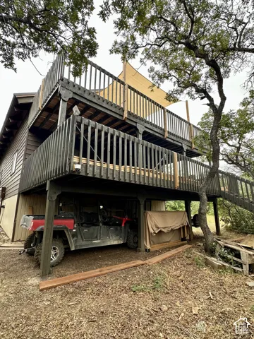 Multi-level outdoor decks with dark wood railings
