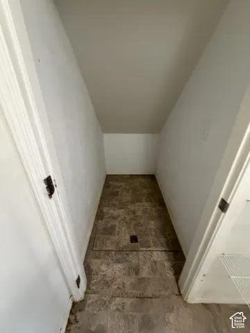 Angled ceiling lines with neutral wall paint