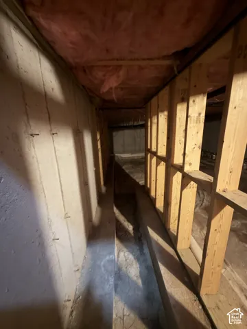 Not high enough to qualify as a basement, but a very spacious crawling space with plenty storage room.