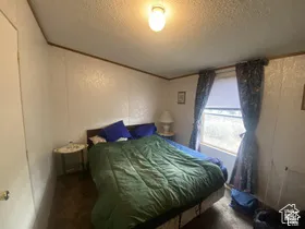 Recessed window with patterned drapes