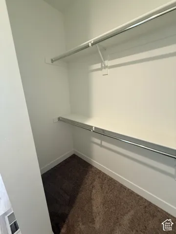 Built-in shelving with integrated hanging rods