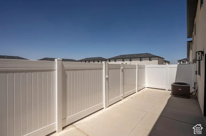 Private outdoor patio with concrete paving