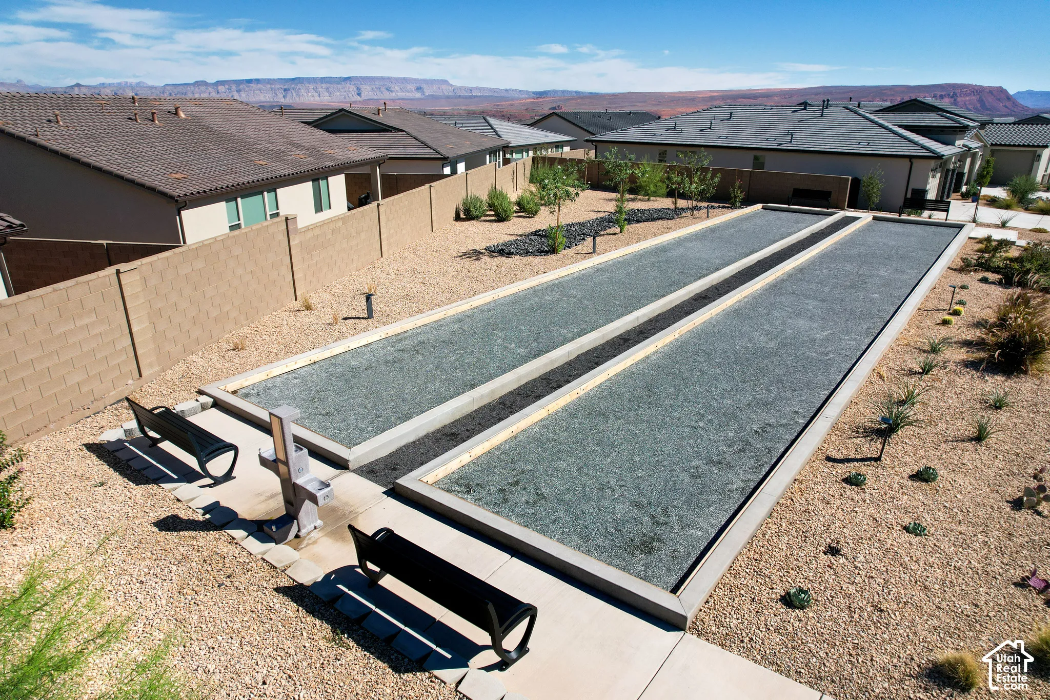 Dual bocce ball courts with perimeter seating