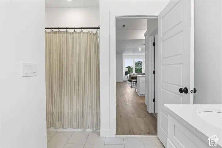 White paneled door with matte black hardware