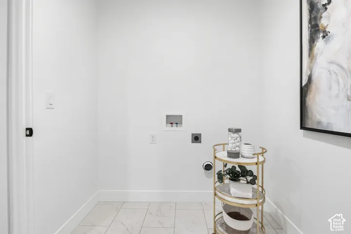 White walls with a light-colored tile floor