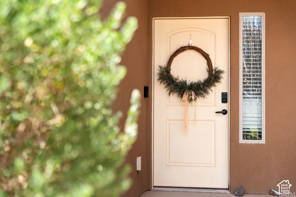 Entry door with panel detailing and matte black hardware