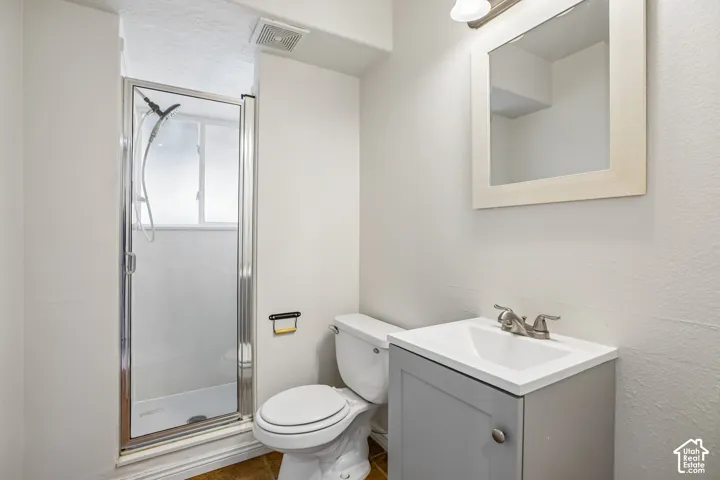 Framed mirror with integrated vanity lighting