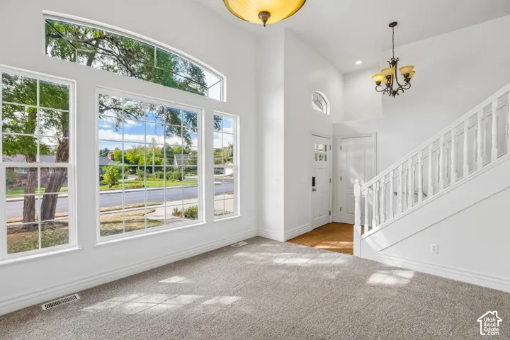 Vaulted ceilings with an arched transom window
