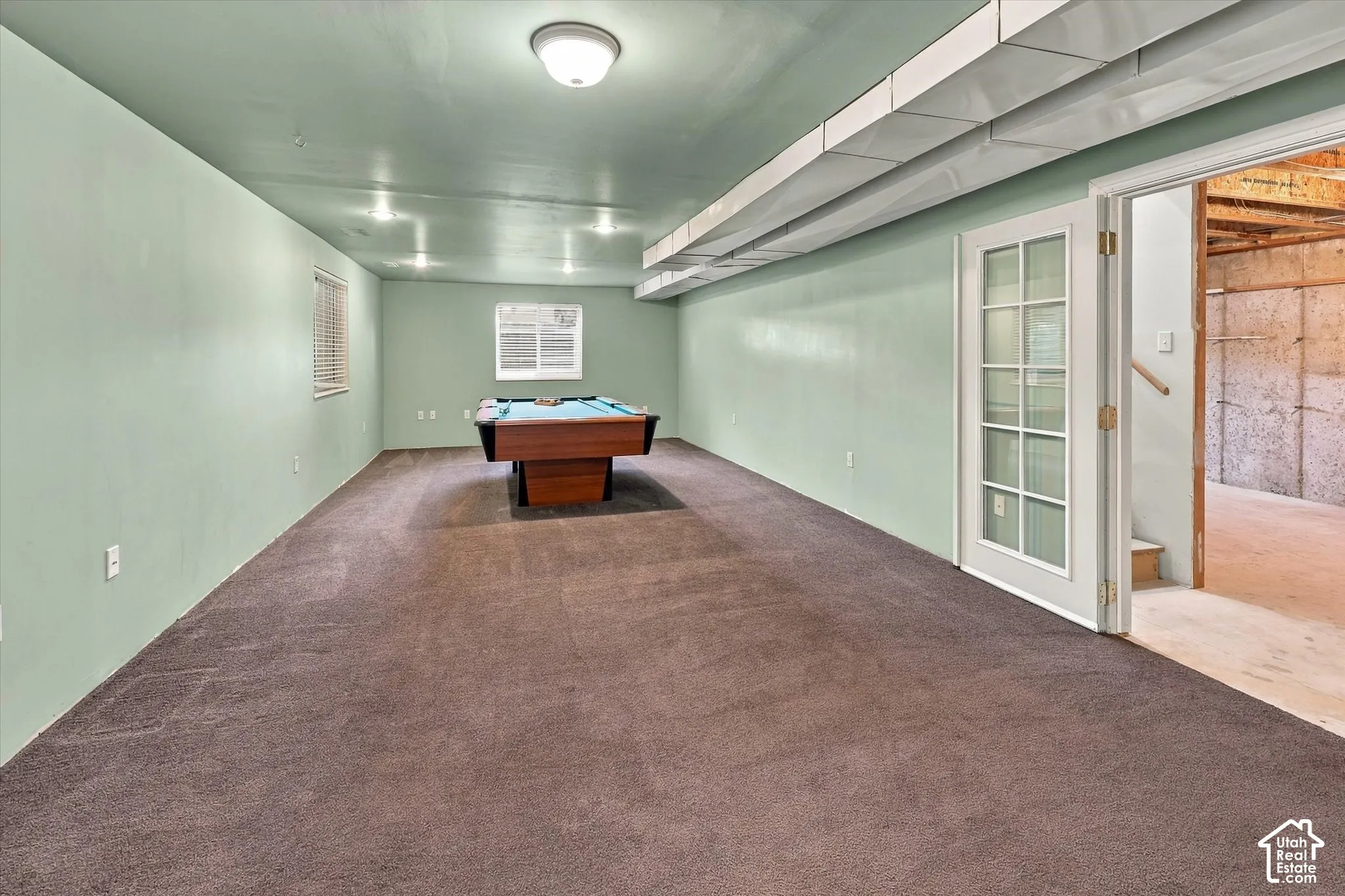 Beautiful French doors leading into recreation room.