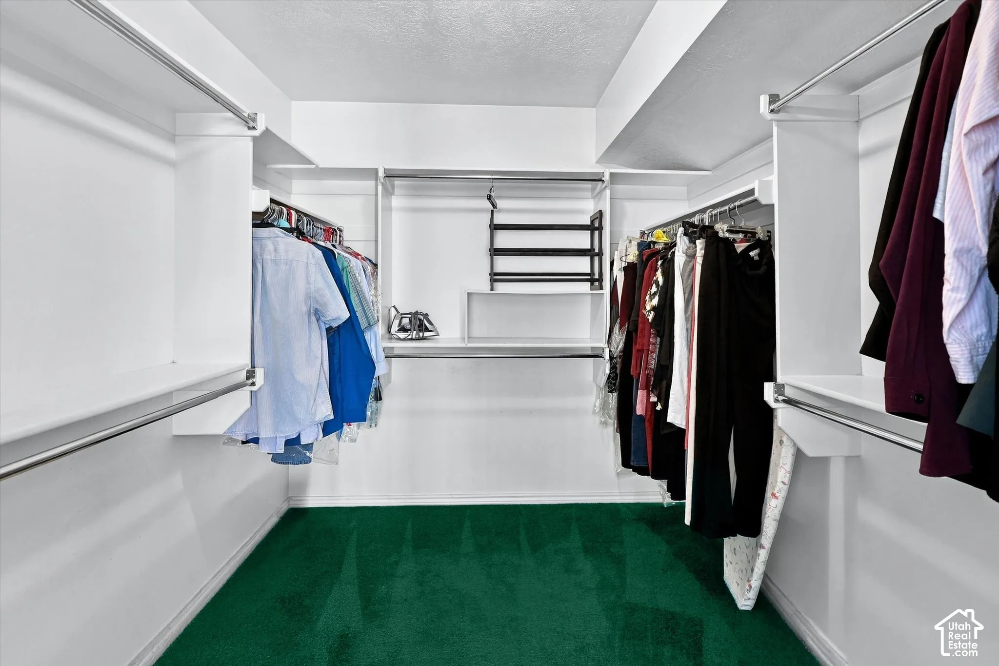 Oversized walk-in closet in Primary Suite.