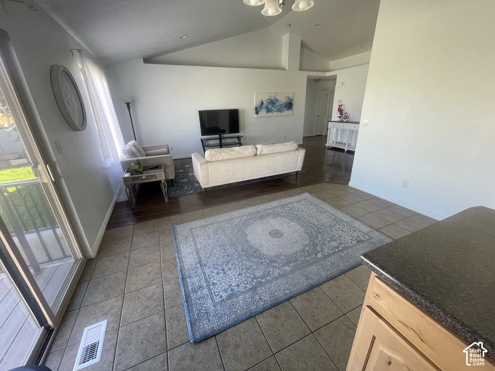 Vaulted ceilings create an expansive atmosphere