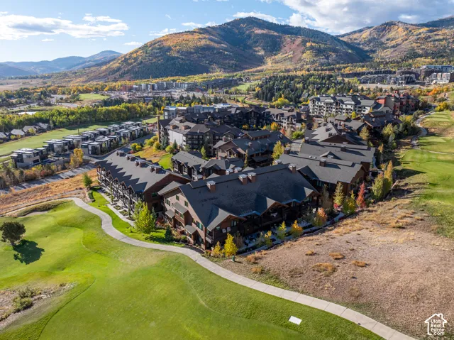 Expansive golf course frontage with mountain backdrop