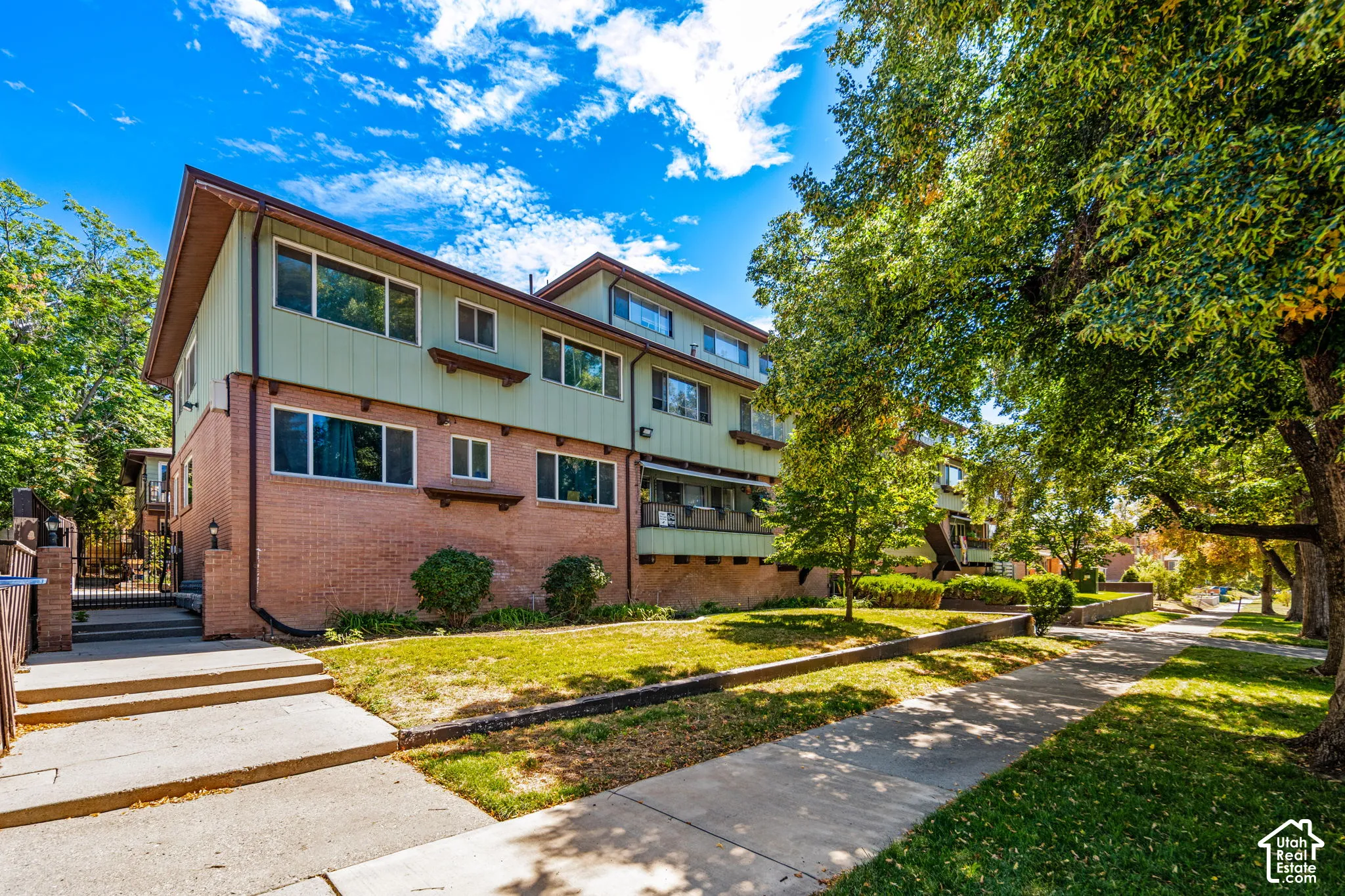 Brick and siding exterior with multiple windows