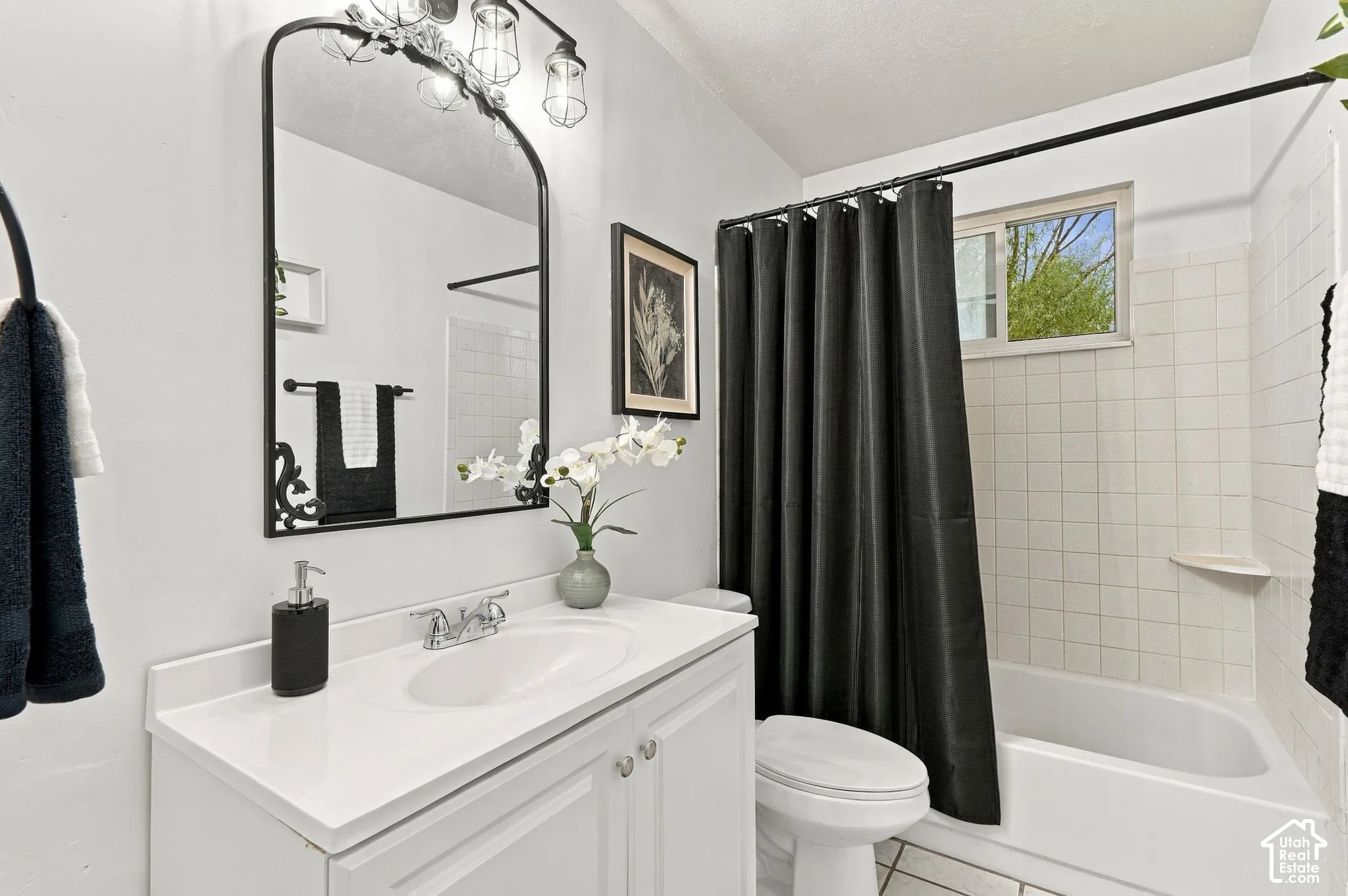 New white vanity with an integrated sink and chrome faucet
