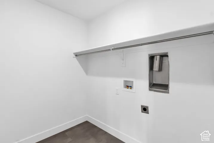 Full-size, dedicated laundry room.