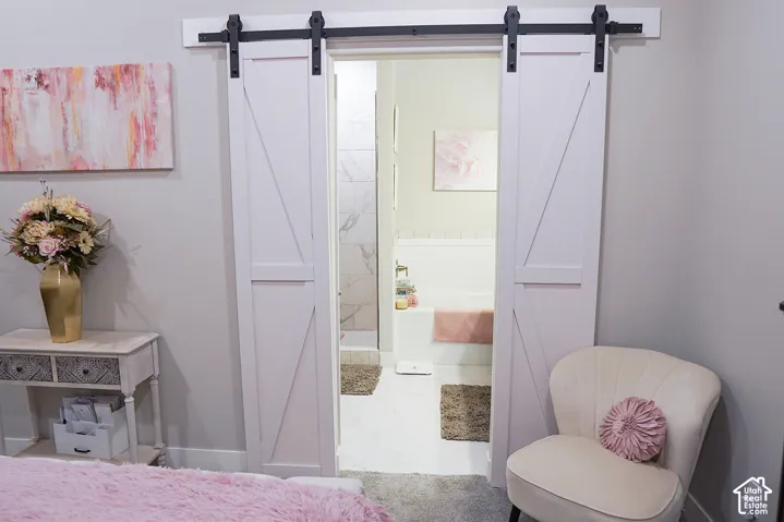 White sliding barn doors with black hardware