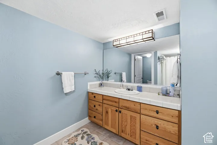 Wood-finish vanity with ample storage