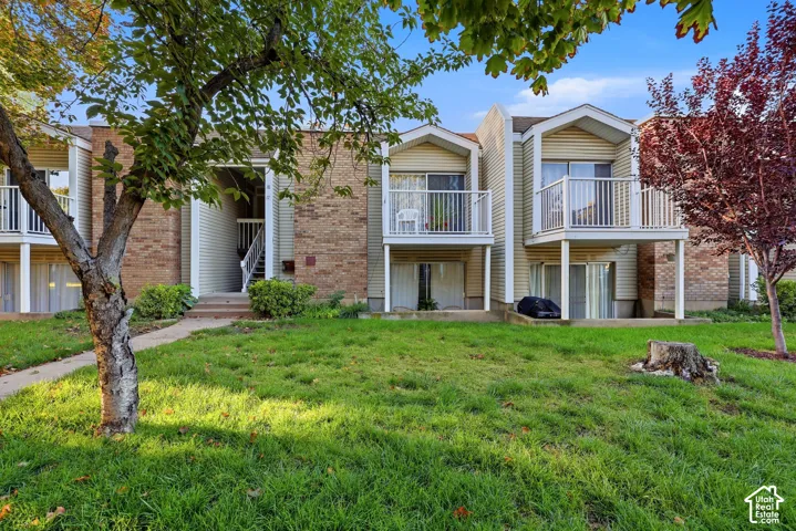 Brick and siding exterior with multiple private balconies