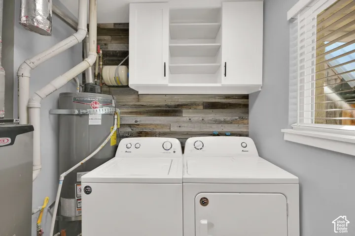 White shaker-style cabinetry with matte black hardware