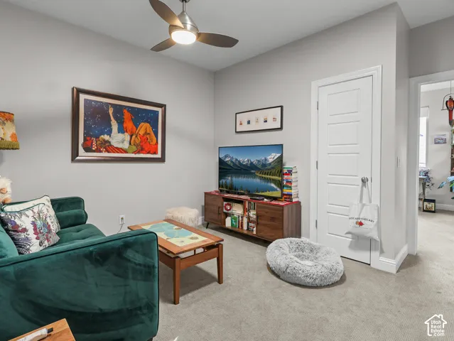 Neutral-toned wall paint with a built-in ceiling fan and light fixture