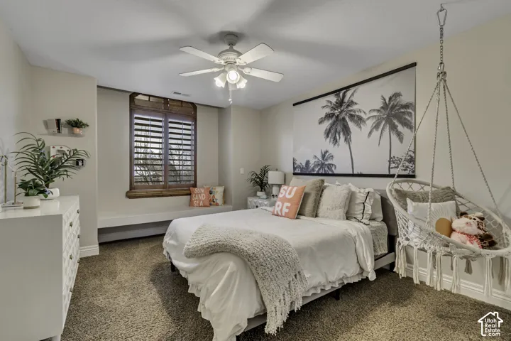 Window featuring wood-finish plantation shutters