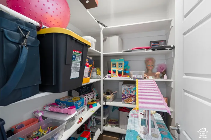 White shelving system with multiple storage levels