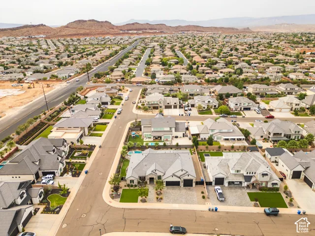 Expansive residential area with numerous single-family homes, paved streets, and varied architectural styles
