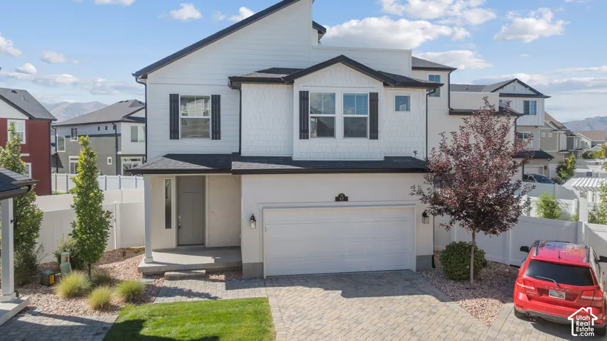 Contemporary white exterior with dark trim accents