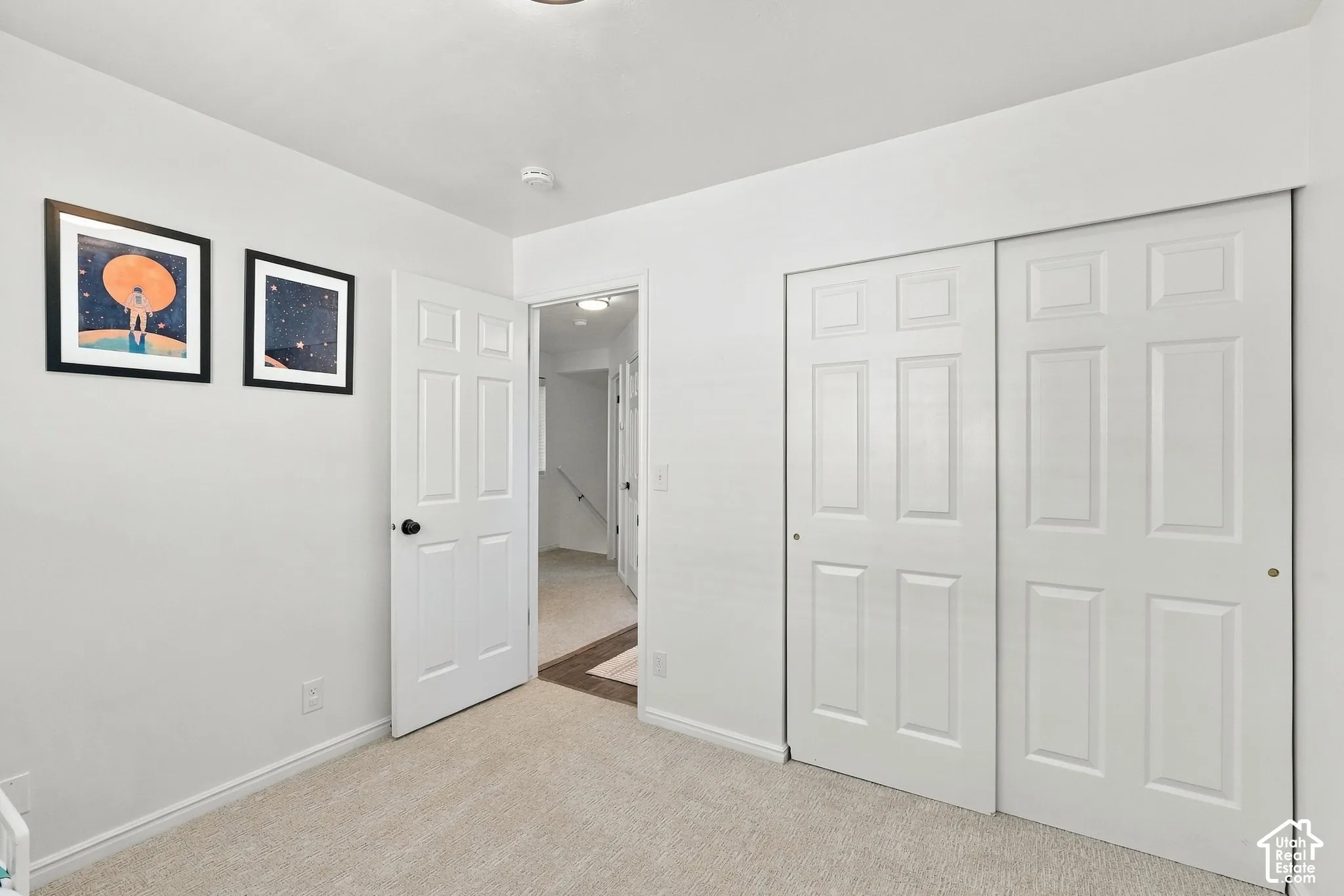Third bedroom with natural light and neutral colors