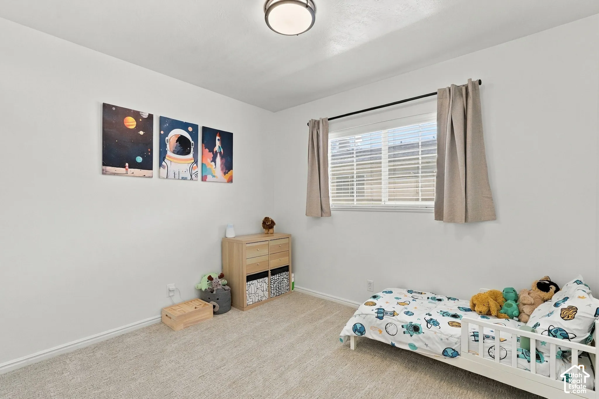 Third bedroom with natural light and neutral colors