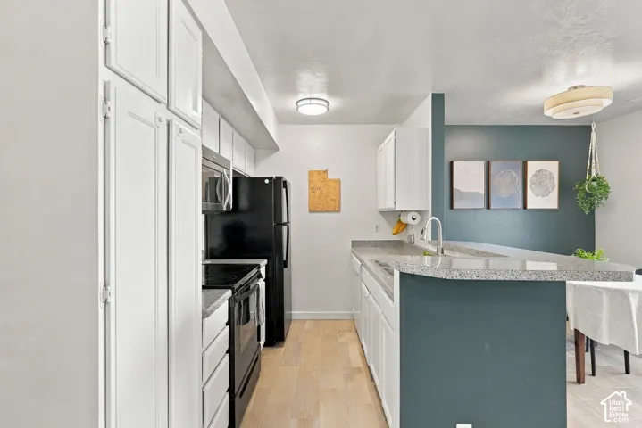 Open concept kitchen/living/dining