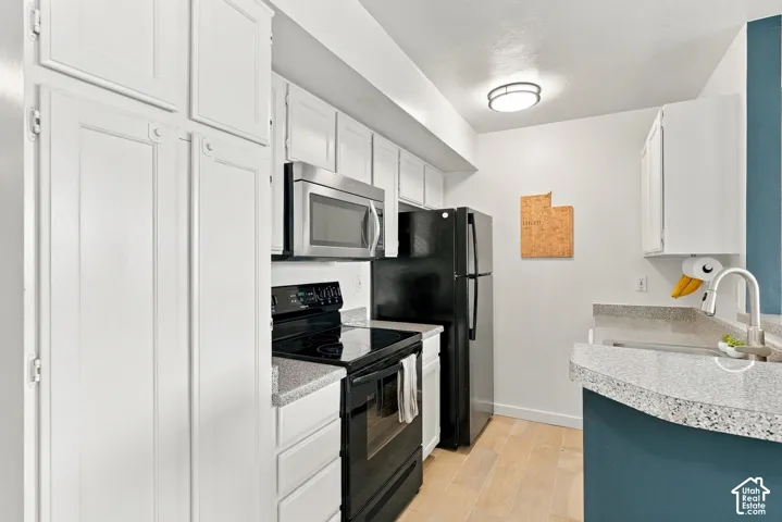 Open concept kitchen/living/dining
