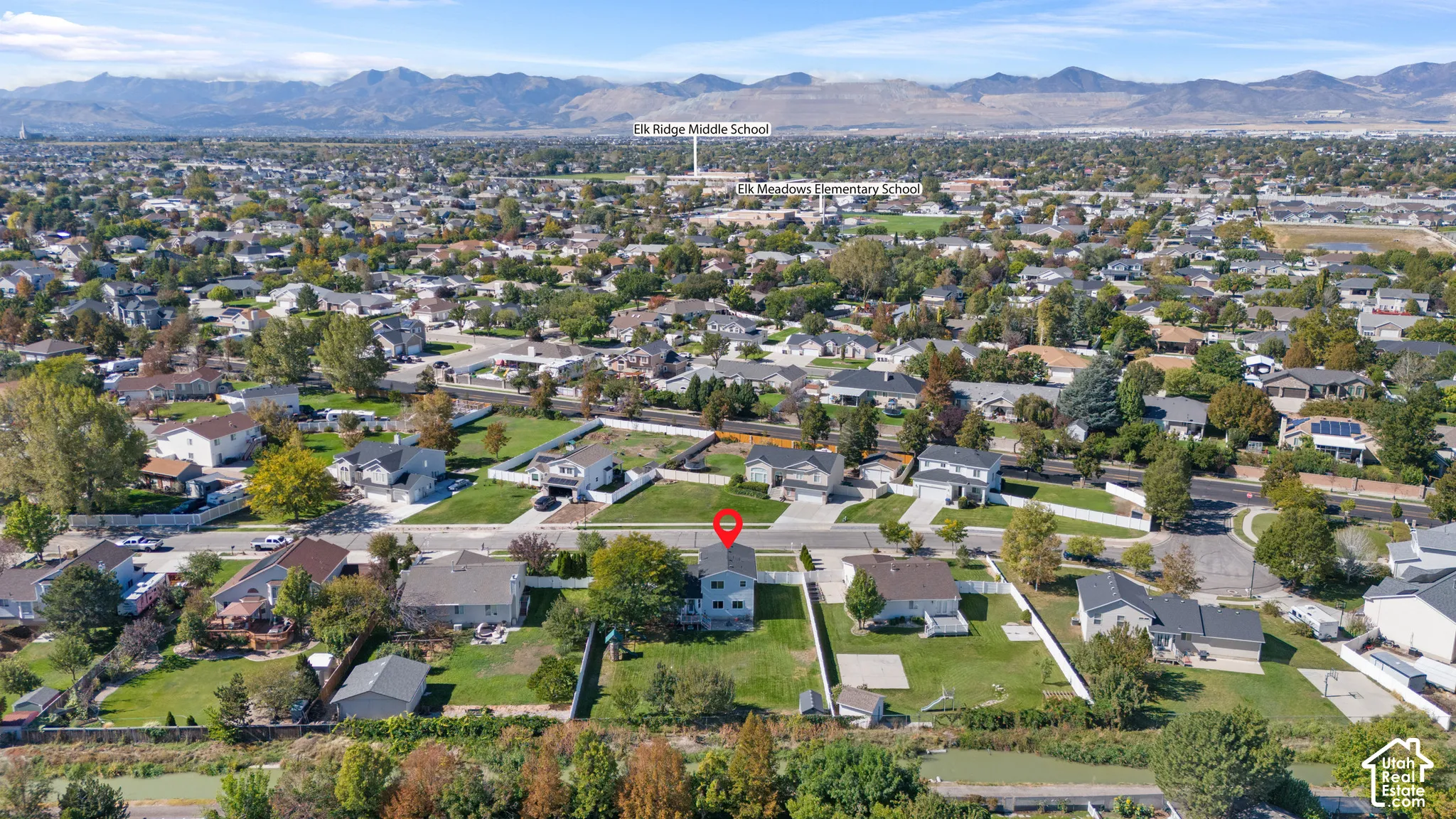 Aerial perspective showcasing residential properties within a developed neighborhood