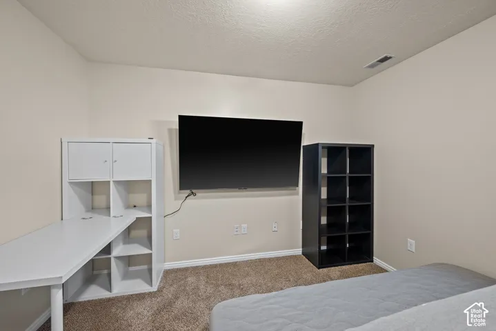 Built-in desk with integrated shelving and cabinetry