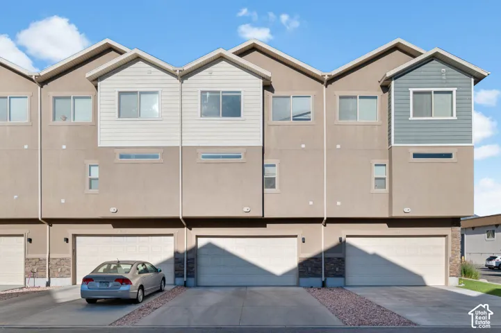 Multi-story townhome with attached garages