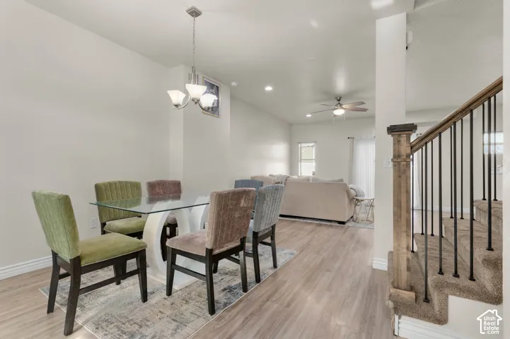 Open-concept living space with wood-finish flooring