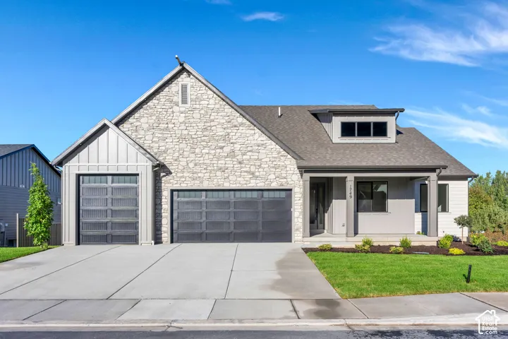 Stone veneer facade with board and batten accents