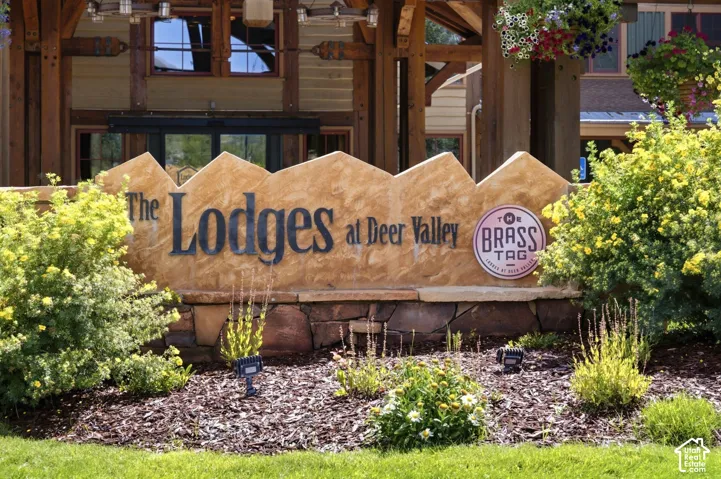 Stone-clad monument sign with "The Lodges at Deer Valley" text