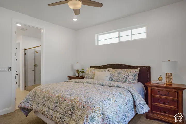 Recessed lighting, wood-finish ceiling fan, and high horizontal window