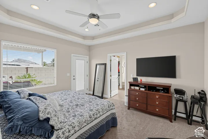 Master Bedroom with Door out to the Jacuzzi and patio