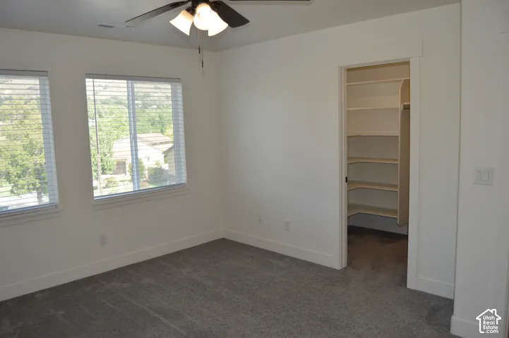 Neutral gray carpeting and white walls