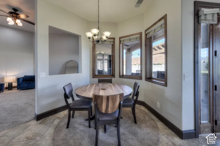 Built-in wall niche, recessed lighting, and wood-framed windows