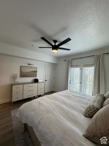 Wood-finish flooring with a textured area rug