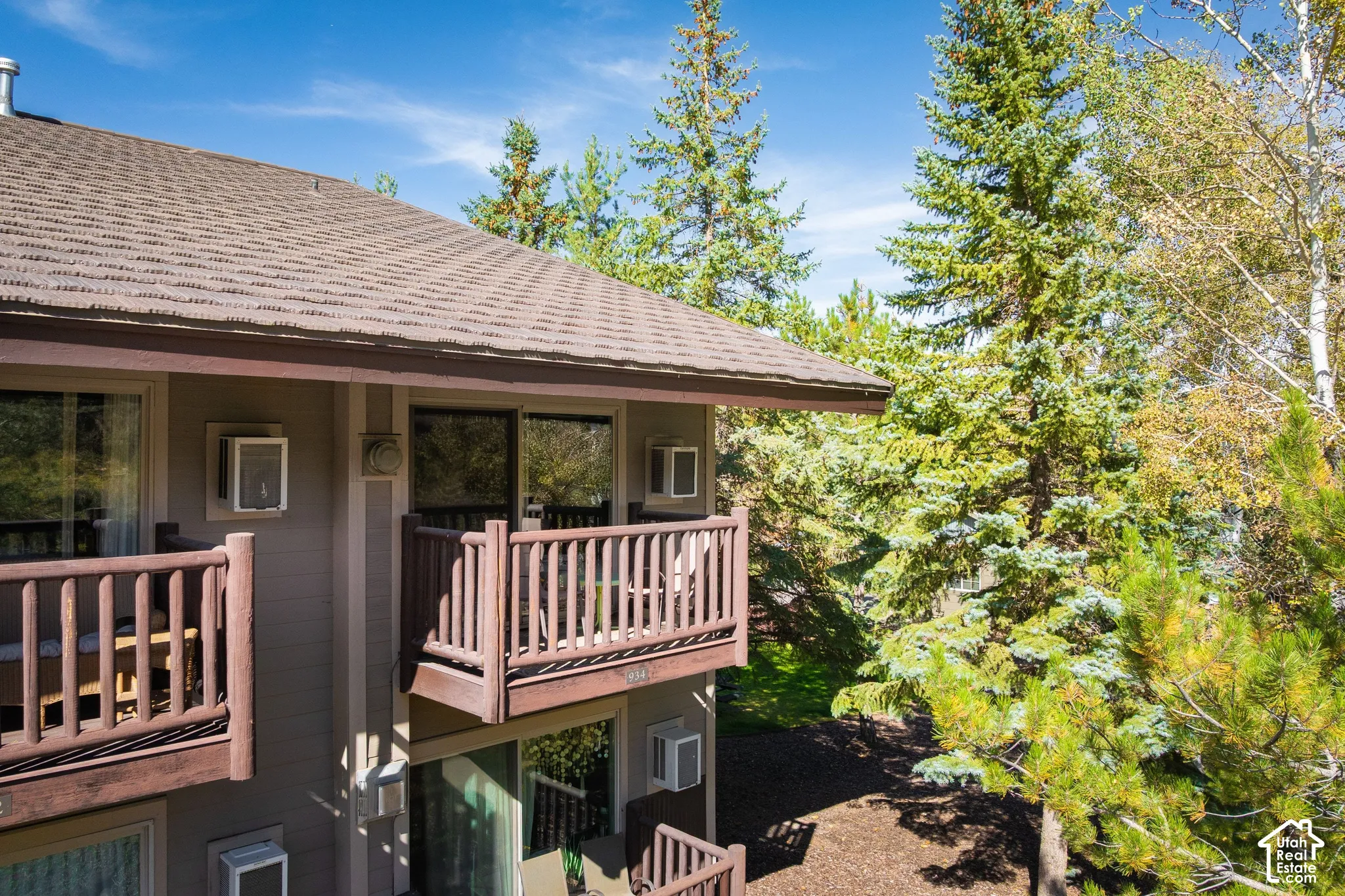 Exterior balconies with wood railings