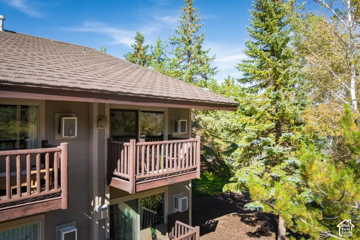 Exterior balconies with wood railings
