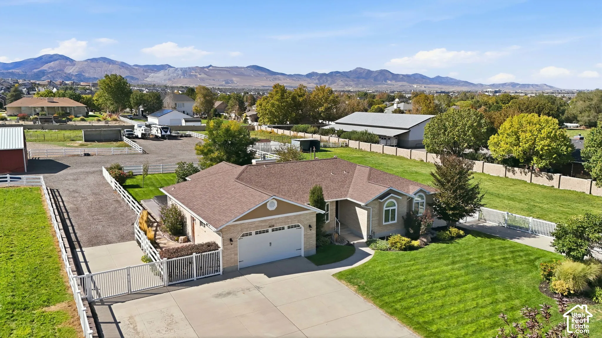 Single-story residence featuring a two-car garage with an automatic door