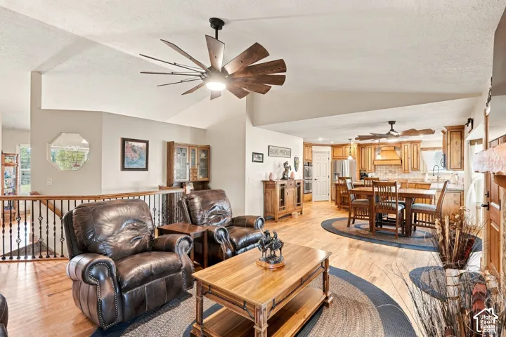Vaulted ceilings and wood-finish flooring throughout